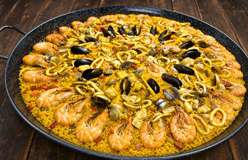 Desde $19.80: Paella de carne o mariscos
